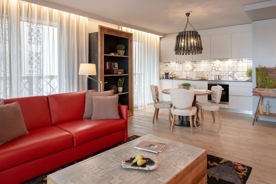 Two-Bedroom Apartment | Living area | 55-inch flat-screen TV with satellite channels, TV, tablet