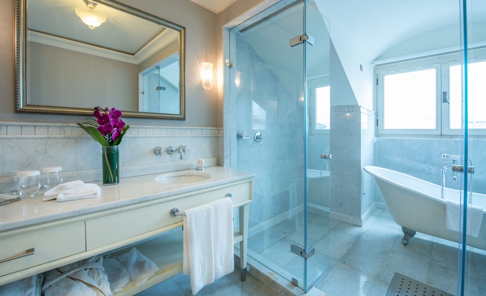Jacqueline Kennedy Room | Bathroom | Rainfall showerhead, eco-friendly toiletries, hair dryer, bathrobes