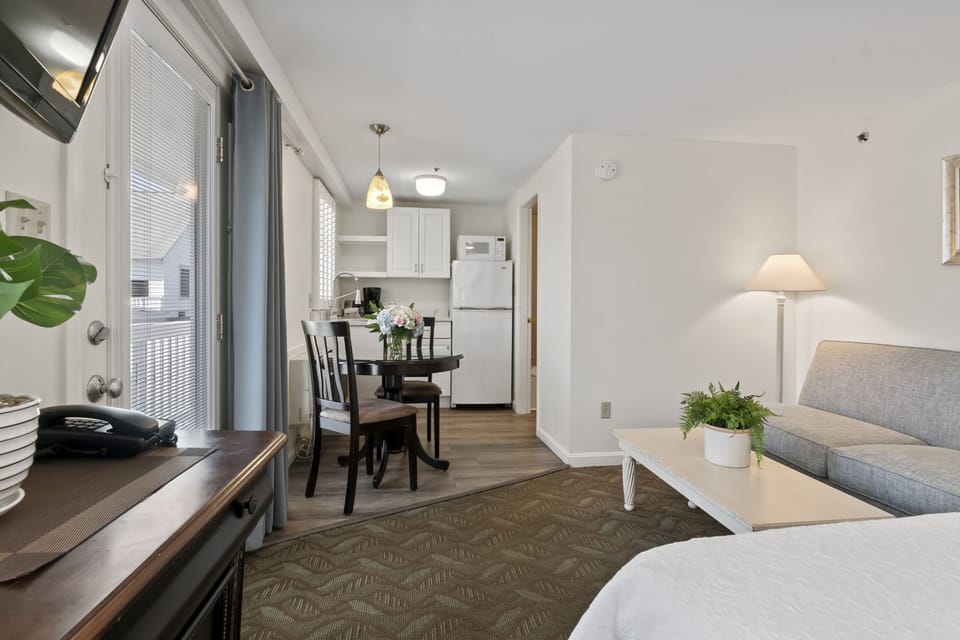 Studio, 1 Queen Bed, Kitchenette (Stairs Required) | Individually furnished, iron/ironing board, free WiFi, bed sheets