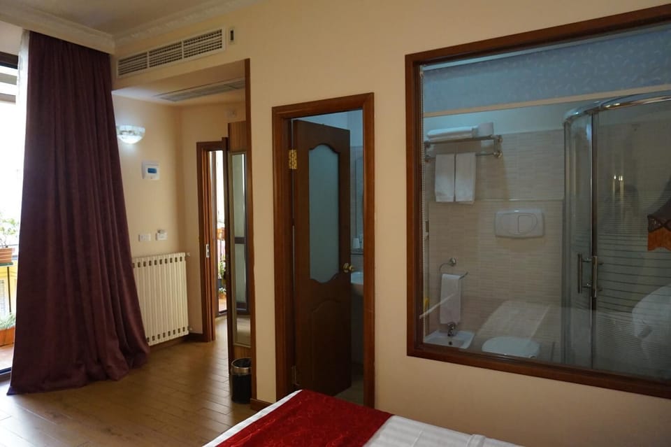 Triple Room | Minibar, in-room safe, iron/ironing board, cribs/infant beds