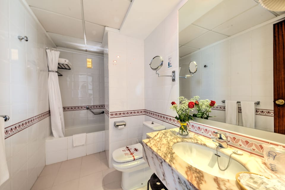 Double Room, Balcony, Sea View | Bathroom | Free toiletries, hair dryer, towels