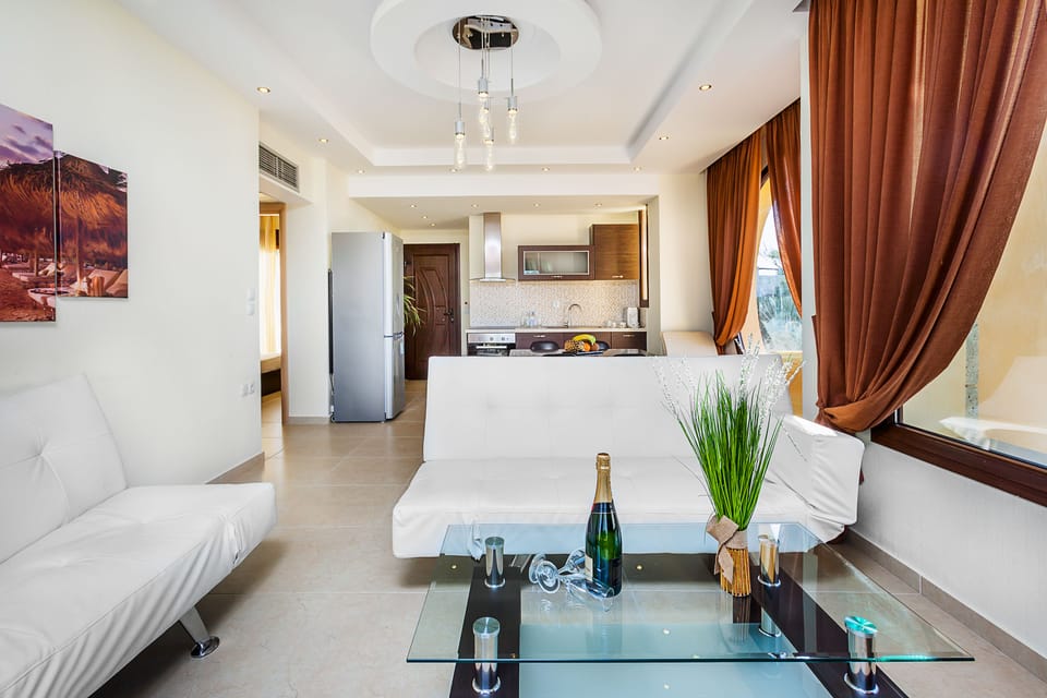 Family Suite 2-Bedroom Sea View | Living area | LCD TV