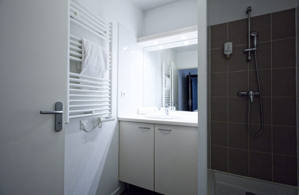 Shower, free toiletries, hair dryer, towels