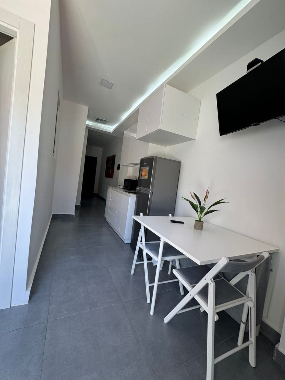 Superior Apartment | Living area | 32-inch TV with cable channels