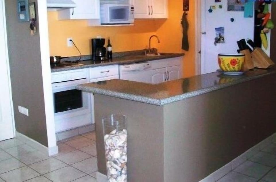 Family Condo, 2 Bedrooms, Ocean View, Beachfront | Private kitchen | Fridge, microwave, oven, stovetop