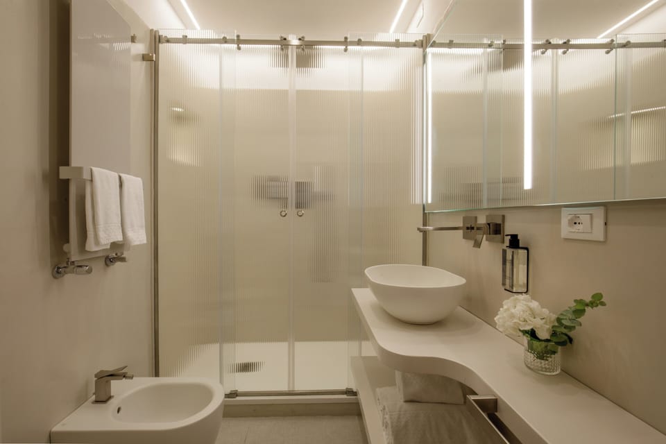 Panoramic Apartment, 1 Bedroom, Annex Building (4 pax) | Bathroom | Shower, free toiletries, hair dryer, slippers