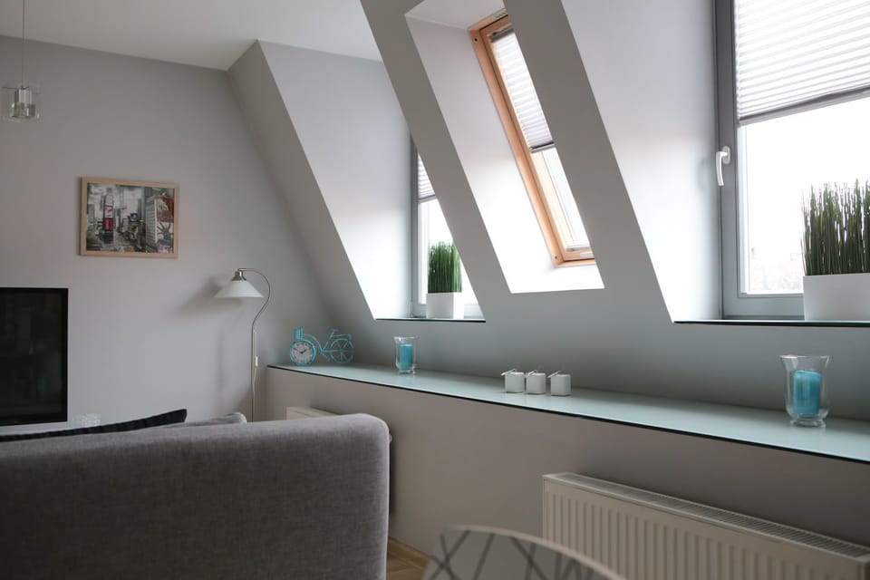 City Studio Suite | Living area | Flat-screen TV