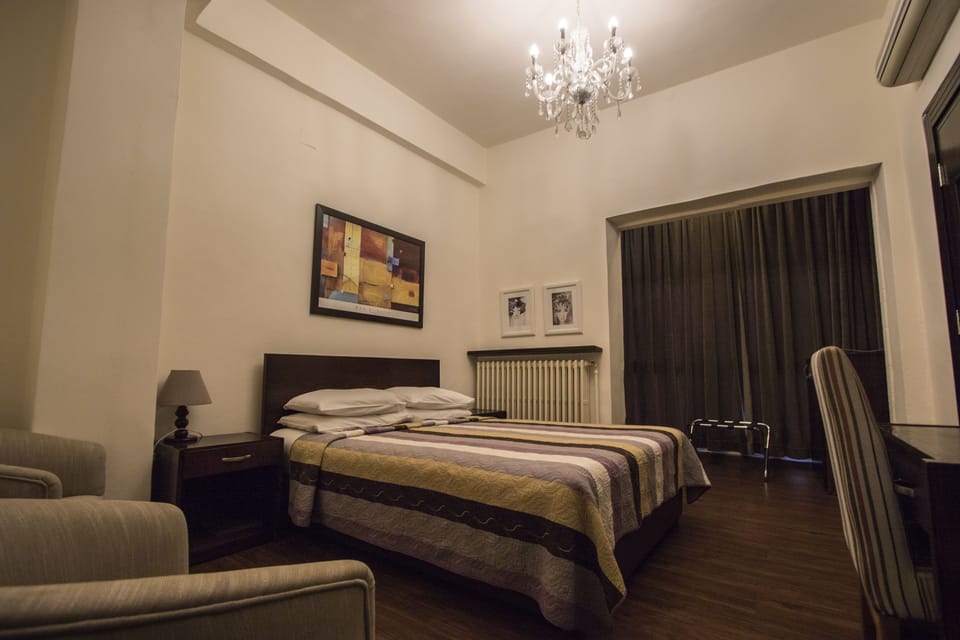 Double or Twin Room | Minibar, desk, WiFi (free), bed sheets