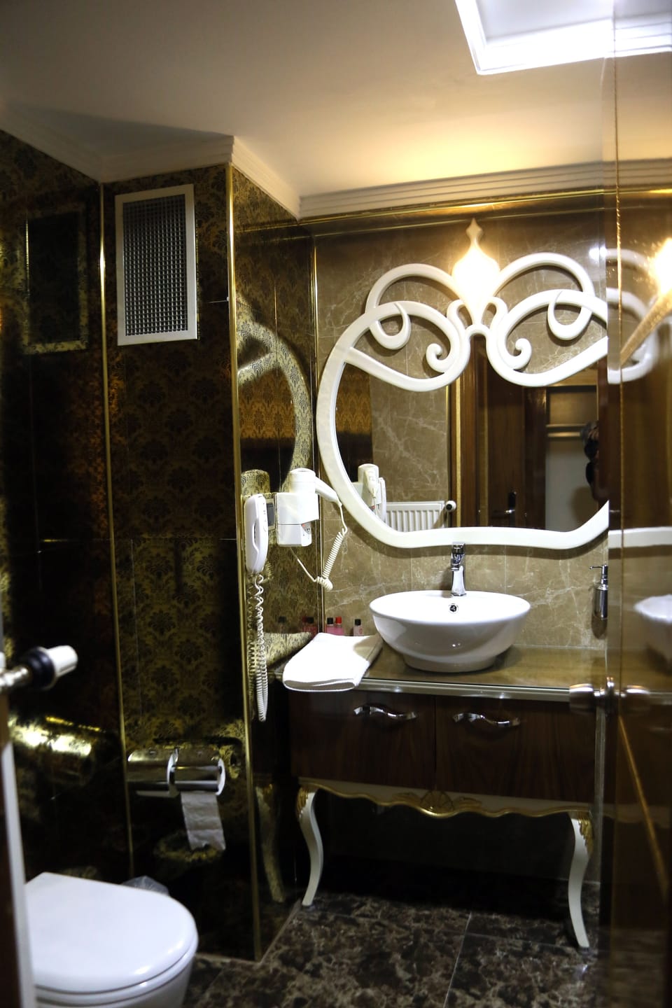 Shower, free toiletries, hair dryer, slippers
