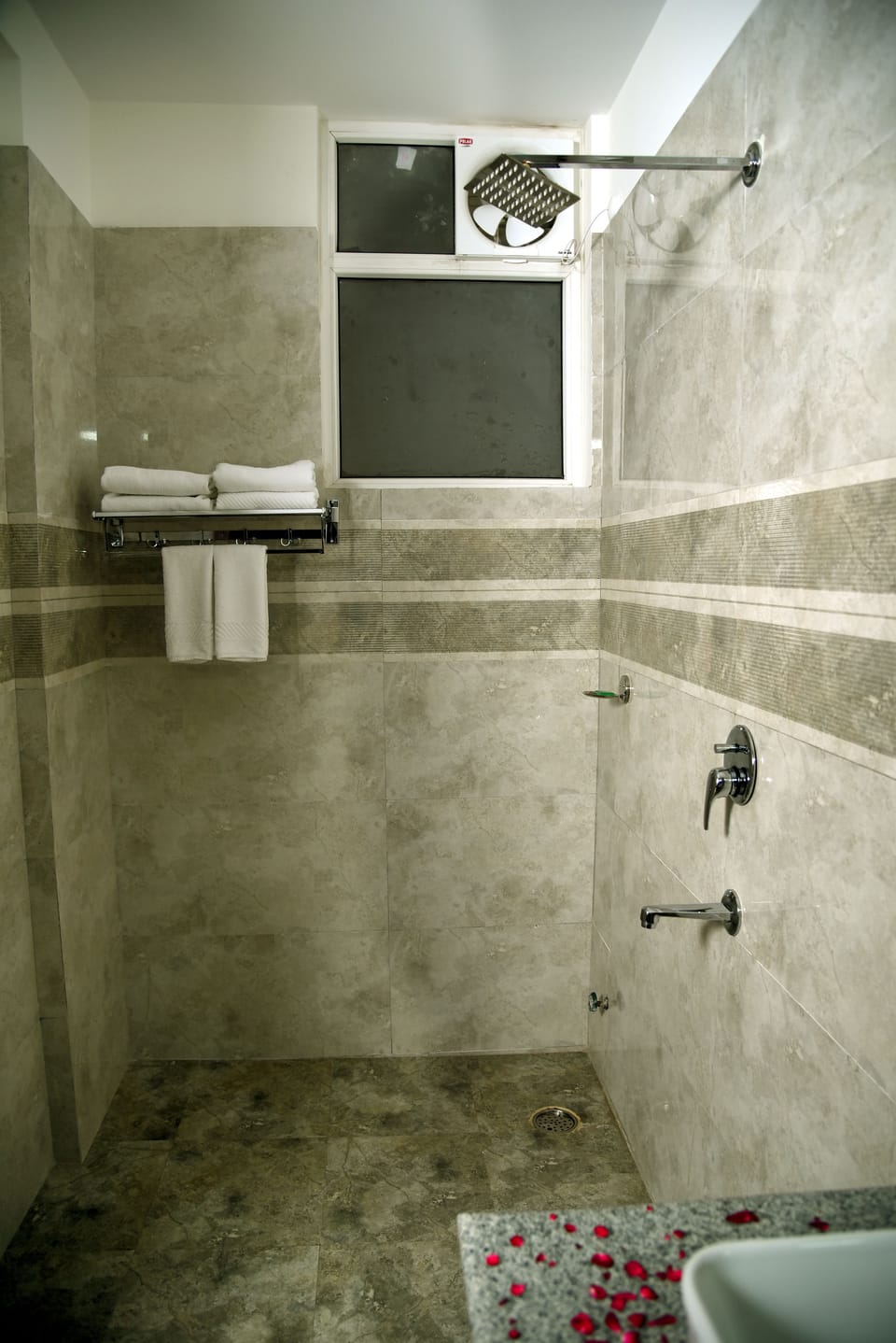 Shower, free toiletries, slippers, towels
