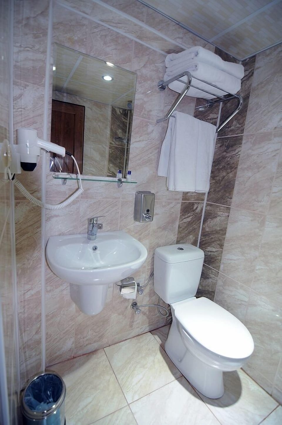 Shower, free toiletries, hair dryer, slippers