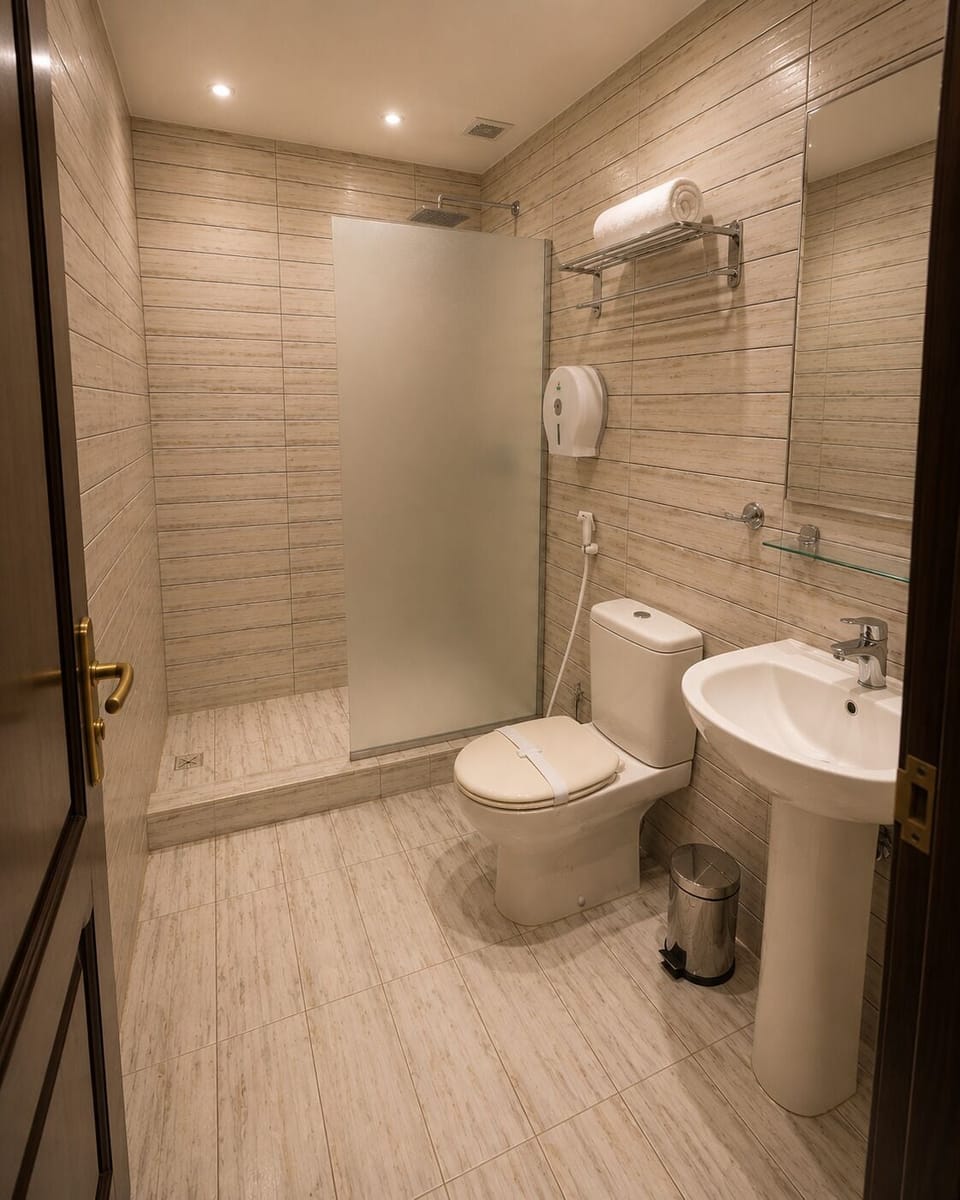 Shower, rainfall showerhead, eco-friendly toiletries, hair dryer