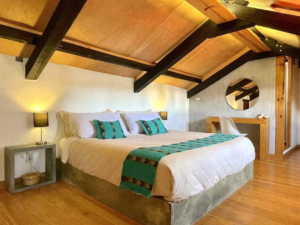 Deluxe Suite, 1 King Bed | Down comforters, desk, laptop workspace, blackout drapes