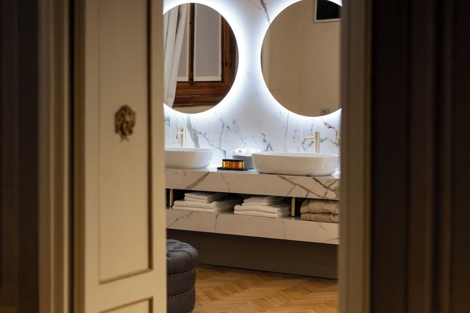 Executive Suite, 2 Bedrooms | Bathroom | Free toiletries, hair dryer, bathrobes, slippers