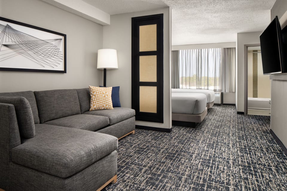 Standard Room, Multiple Beds (2 Double Beds with Sofa Bed) | Premium bedding, desk, laptop workspace, blackout drapes