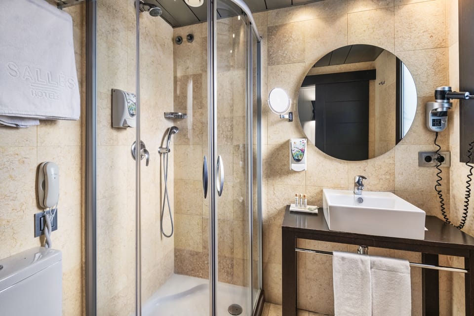 Shower, free toiletries, hair dryer, towels