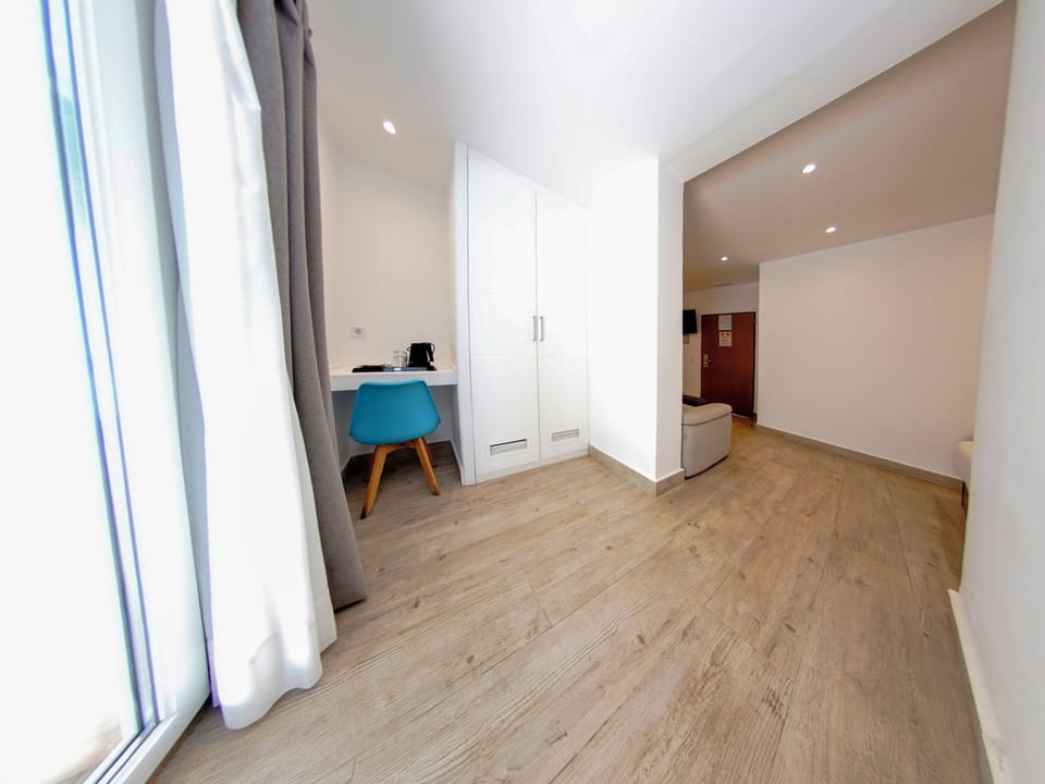 Club Quadruple Room with Free Airport Shuttle | Down comforters, minibar, in-room safe, individually decorated