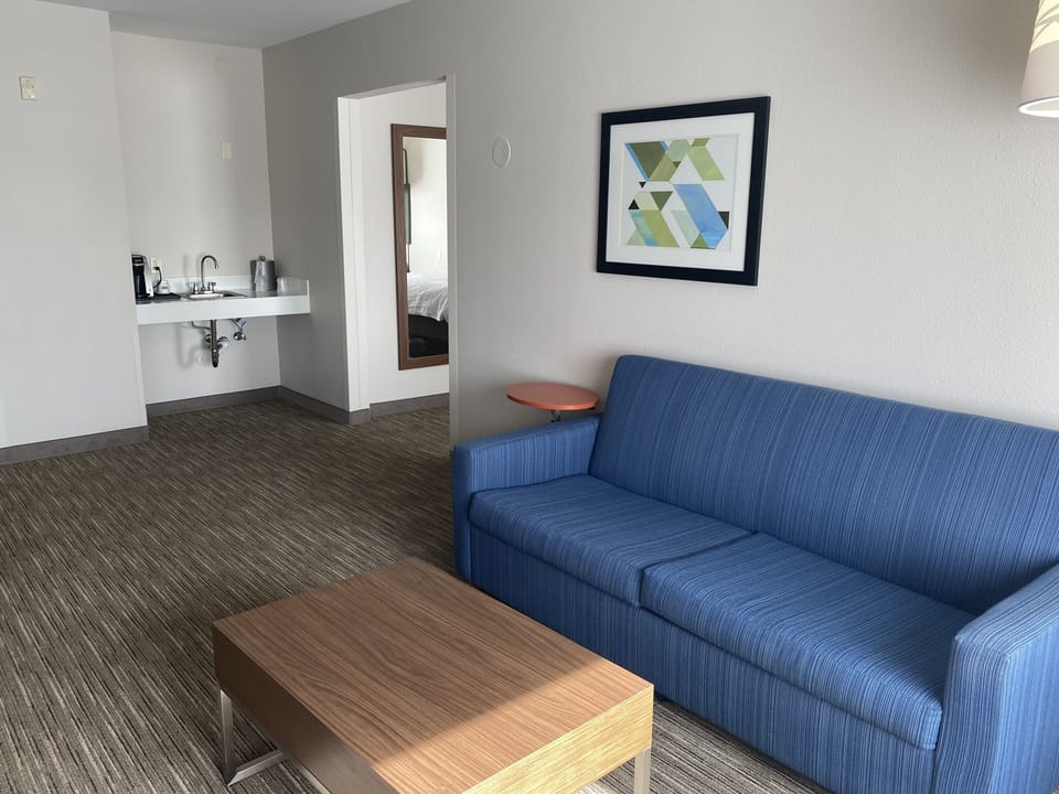 Suite, 1 King Bed with Sofa bed | Pillowtop beds, desk, laptop workspace, blackout drapes