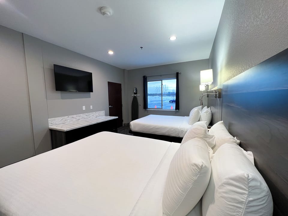 Premier Room, 2 Queen Beds | Hypo-allergenic bedding, down comforters, in-room safe