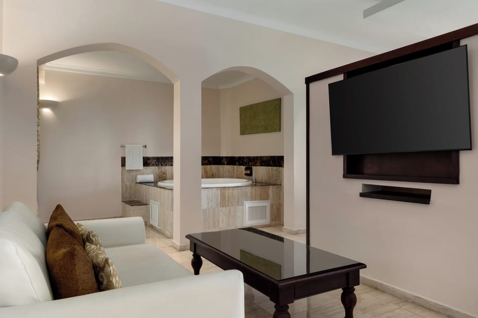 Premium bedding, down comforters, free minibar, in-room safe