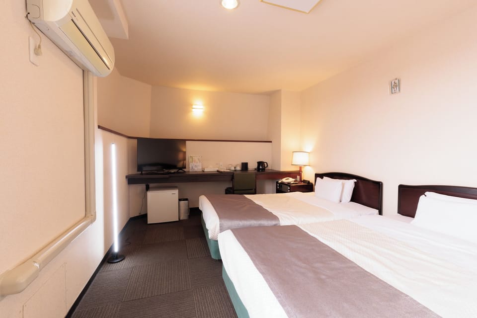 Desk, laptop workspace, free WiFi, bed sheets
