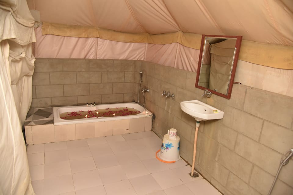 Luxury Tent, Resort View | Bathroom | Shower, free toiletries, towels
