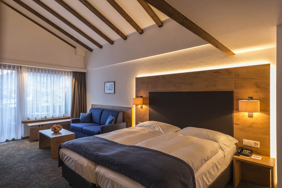 Panoramic Quadruple Room, Mountain View | Hypo-allergenic bedding, minibar, in-room safe, desk