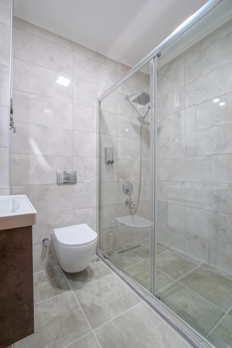 Shower, hair dryer, slippers, towels