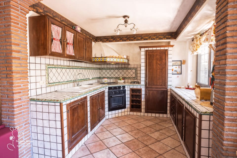 Family Studio Suite, Non Smoking, Patio | Private kitchen | Full-size fridge, cookware/dishes/utensils, spices, cleaning supplies