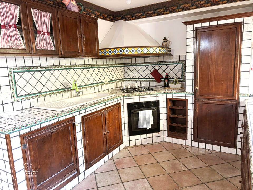 Family Studio Suite, Non Smoking, Patio | Private kitchen | Full-size fridge, cookware/dishes/utensils, spices, cleaning supplies