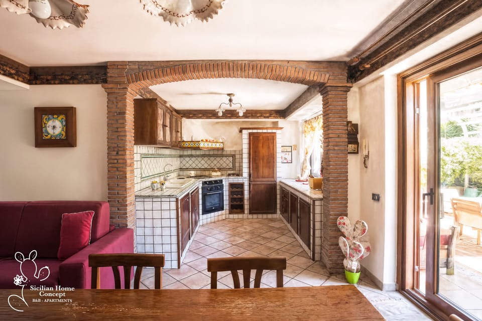 Family Studio Suite, Non Smoking, Patio | Private kitchen | Full-size fridge, cookware/dishes/utensils, spices, cleaning supplies