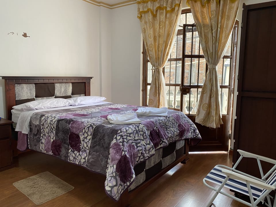 Basic Double Room, 1 Queen Bed | 1 bedroom, in-room safe, WiFi (free), bed sheets