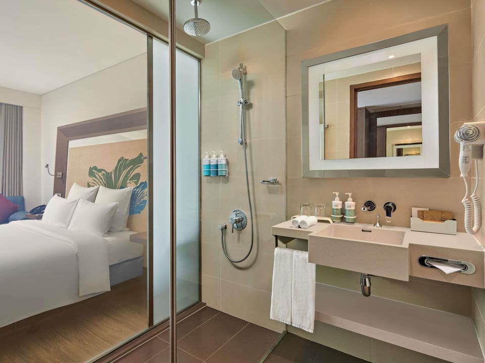 Rainfall showerhead, eco-friendly toiletries, hair dryer, bathrobes