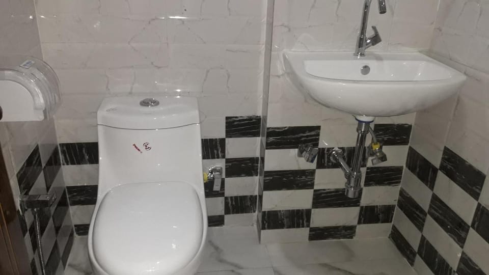 Shower, free toiletries, slippers, towels