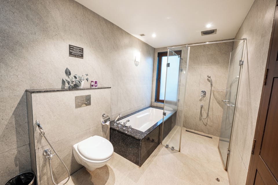 Suite, Smoking, Pool View | Bathroom sink
