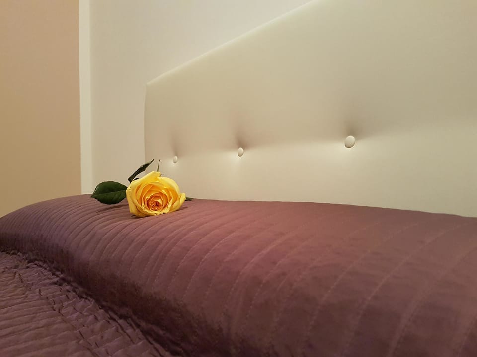 Frette Italian sheets, premium bedding, down comforters