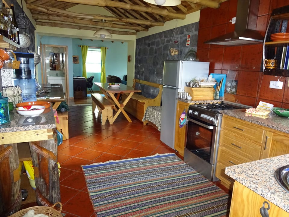 Traditional yet modern kitchen/dining area.
