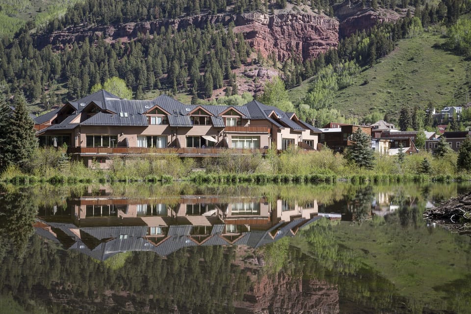 View of Rivercrown from behind, across the beaver pond