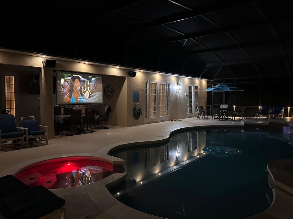 Watch the movies under the stars - 100 inch poolside cinema experience
