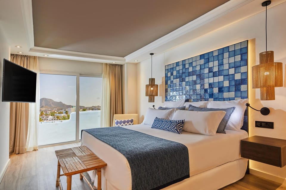 Down comforters, memory foam beds, minibar, in-room safe