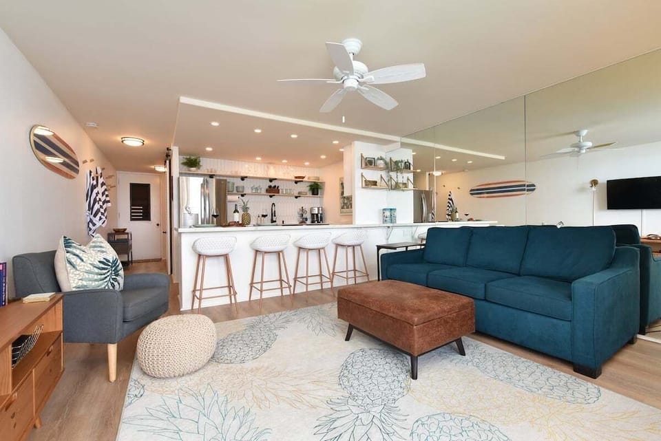 Open lounge with sleeper sofa, ideal for movie nights and providing extra sleeping space