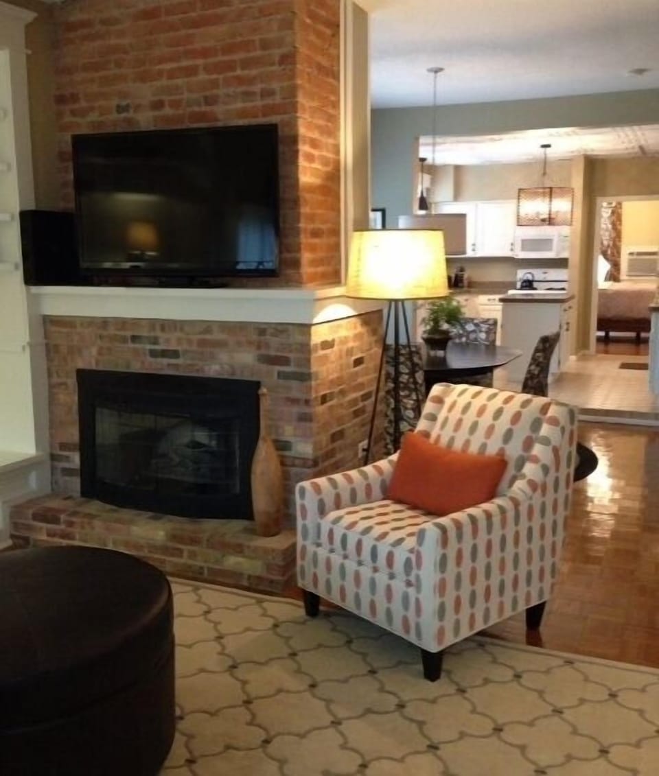 Living area - large flat screen TV, electric fireplace, comfortable seating