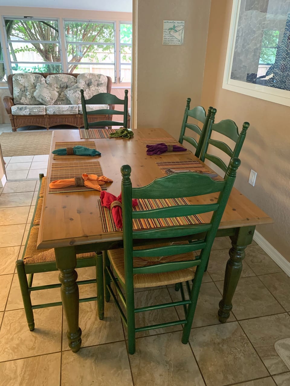 Dining table with view of sunroom