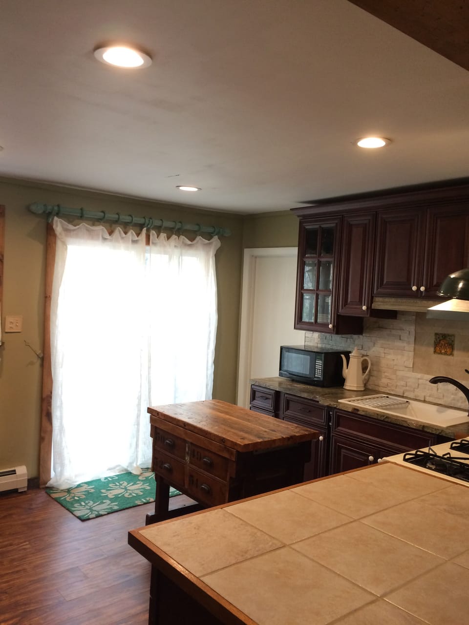 Open concept with sliders to back deck, lets lots of light in! 