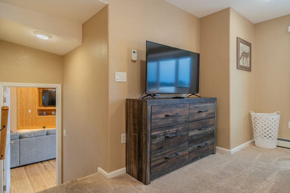 Upstairs Bedroom Smart TV and Dresser