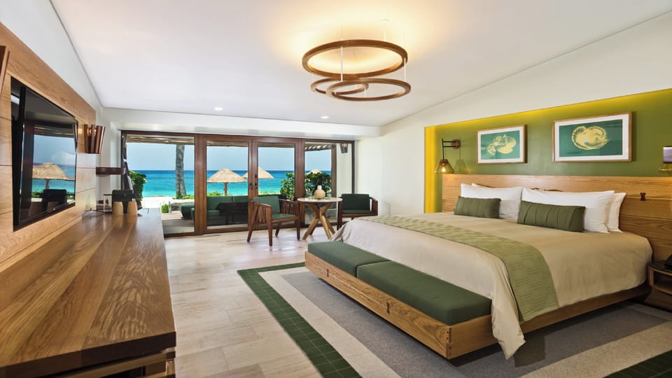 Premium Room, 1 King Bed (Reef View with Beach Access) | Egyptian cotton sheets, premium bedding, down comforters, minibar