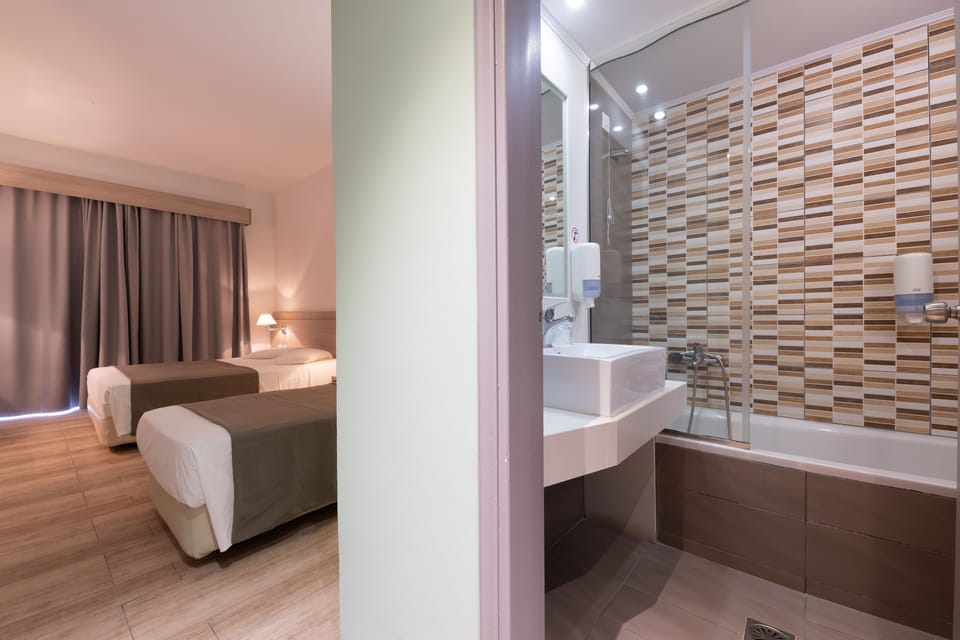 Combined shower/tub, hair dryer, towels, soap