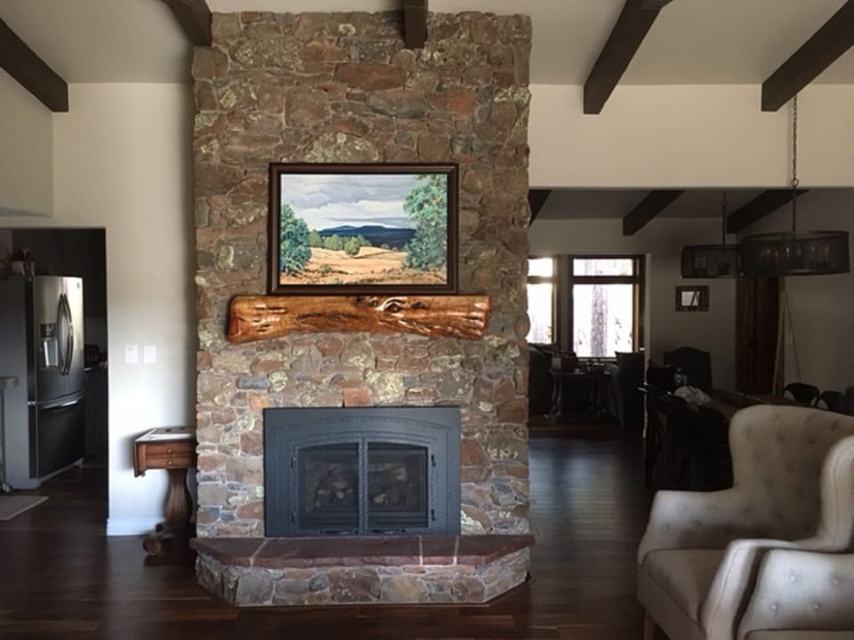 Natural stone gas fireplace in living room