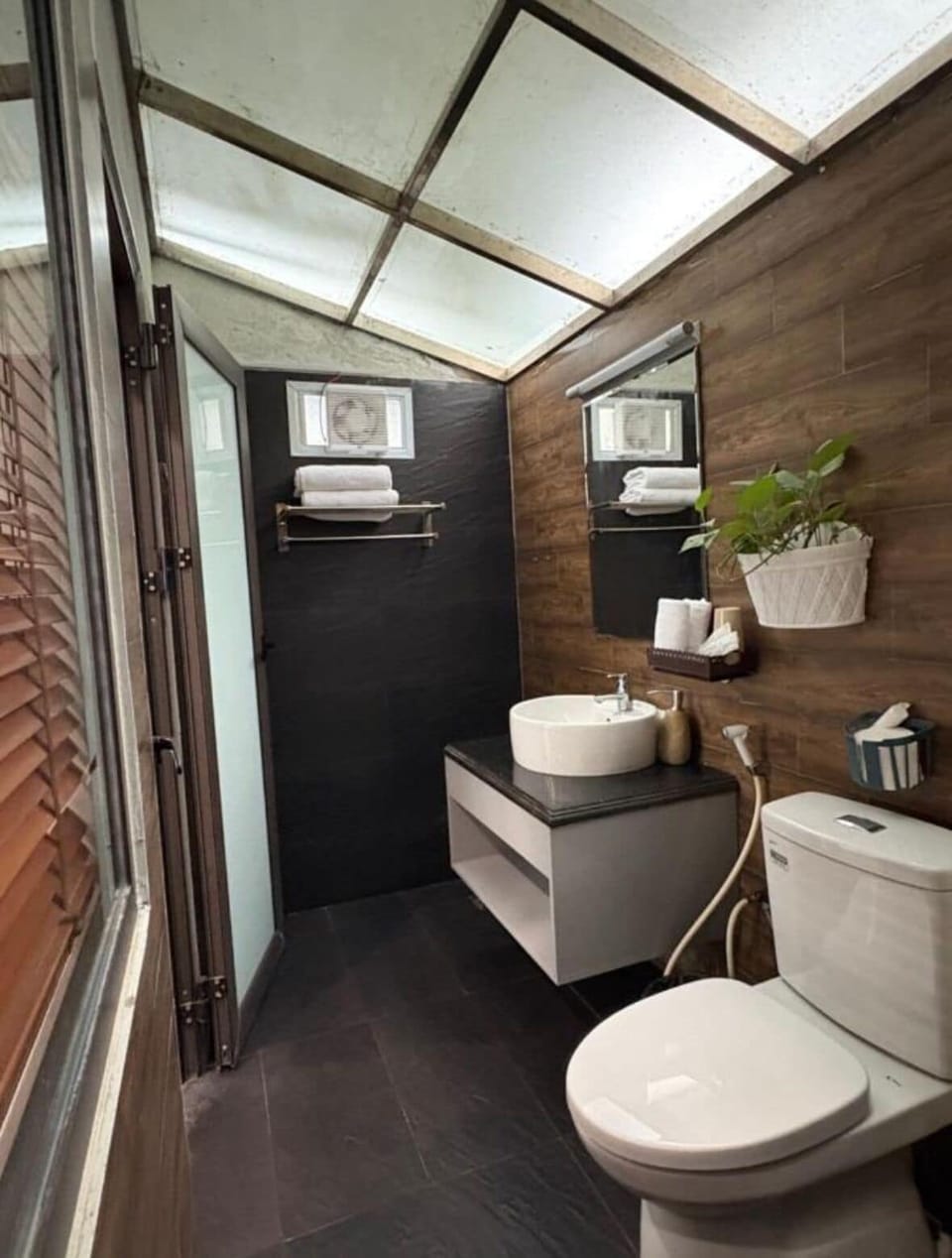 Shower, free toiletries, hair dryer, slippers
