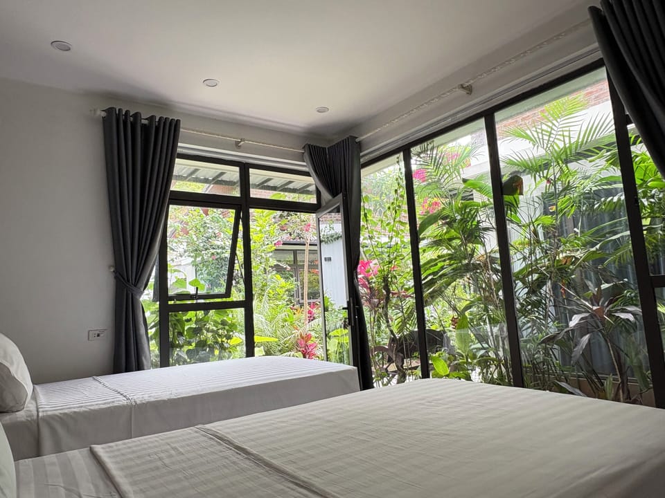 Deluxe Twin Room, Multiple Beds, Garden View | Minibar, desk, blackout drapes, soundproofing